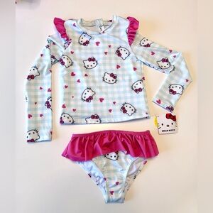 Hello Kitty Sanrio Girls' Rashguard Swim Set with Pink Ruffled Accents, size 6